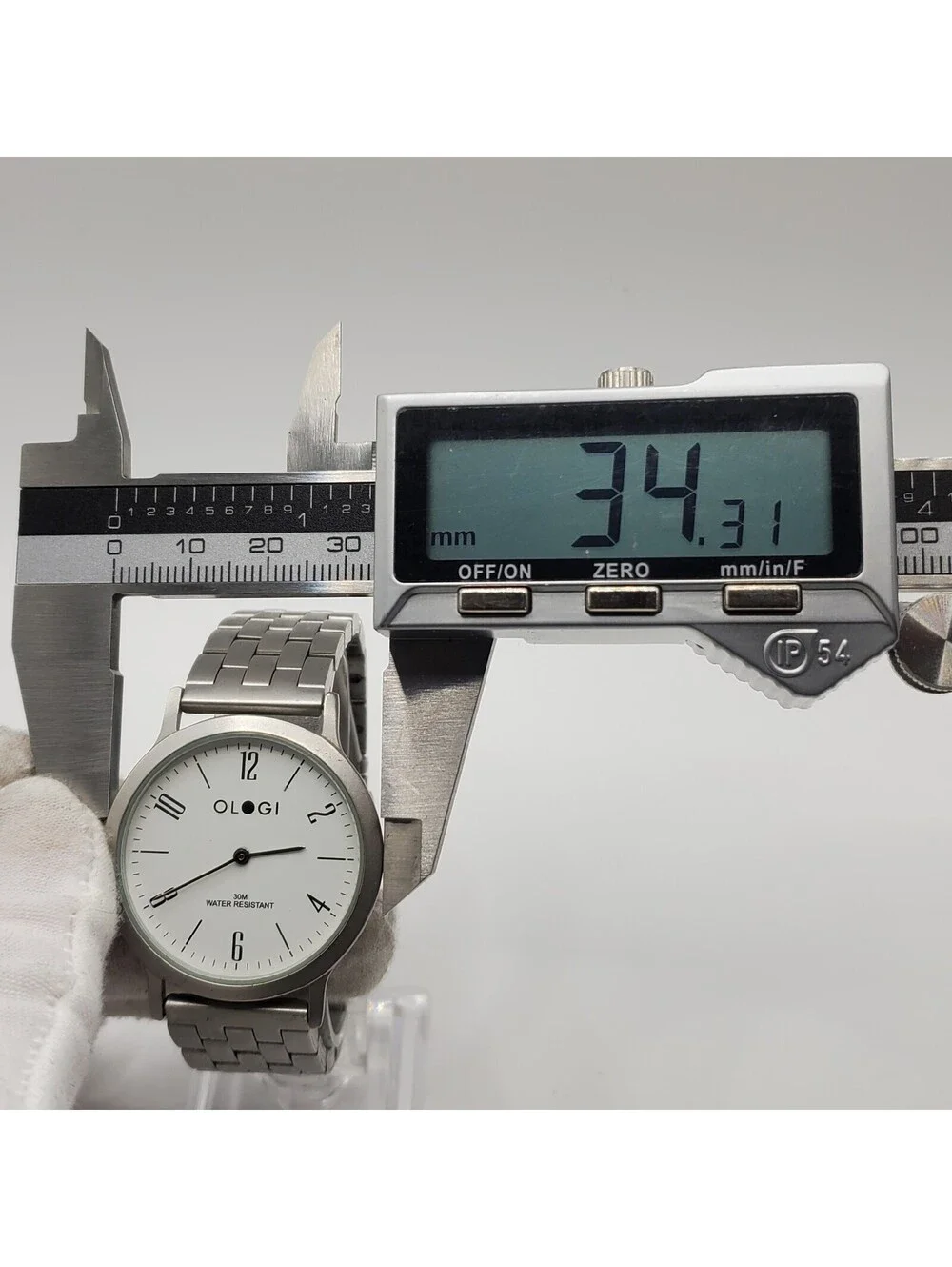 Ologi Quartz Watch 34mm Silver Tone White Dial New Battery